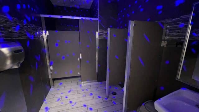 Watch: This Toilet Can Turn Into a Disco Room At The Press Of a Button, dance, public toilet, man